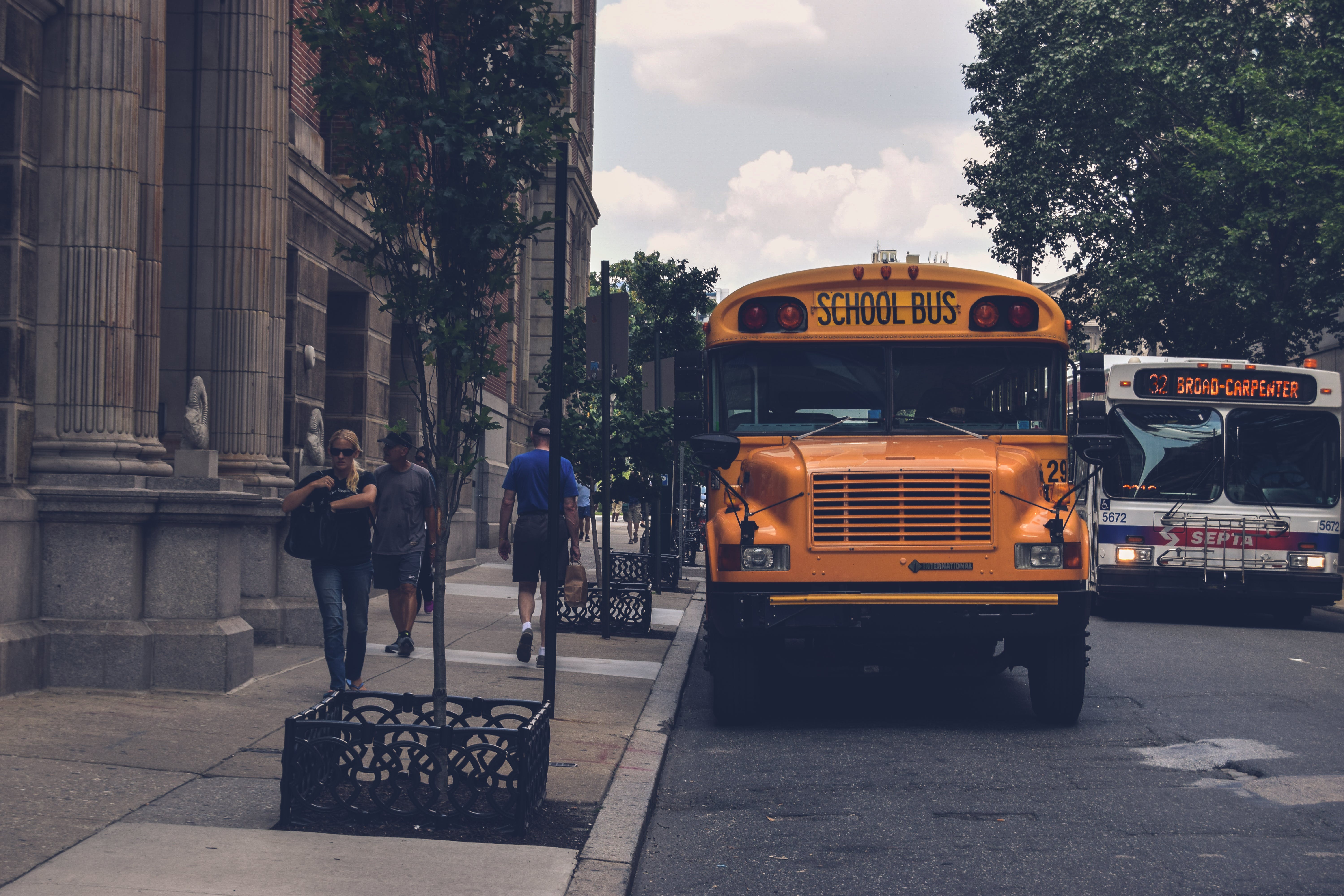 A school bus on a busy city street.