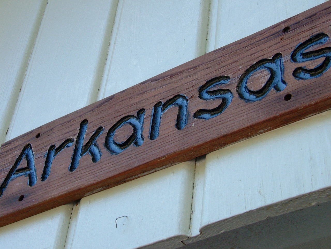 Photo of a sign showing the word "Arkansas."