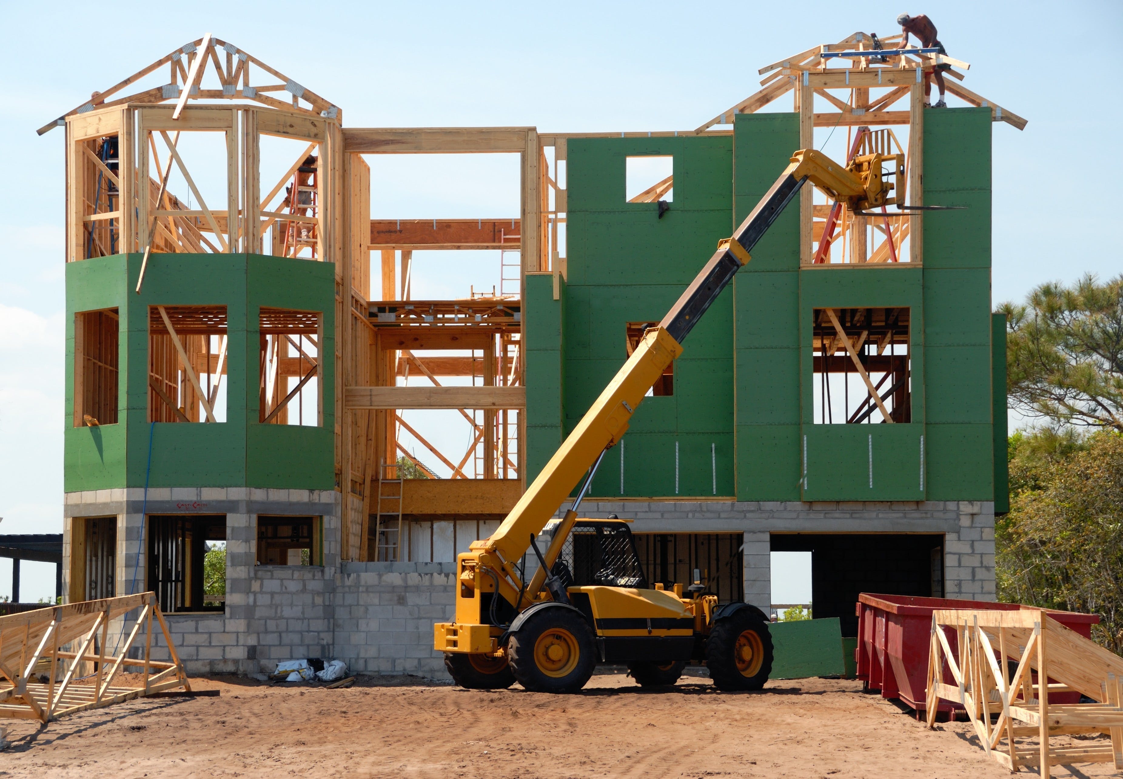 Photo depicting a residential structure under construction.