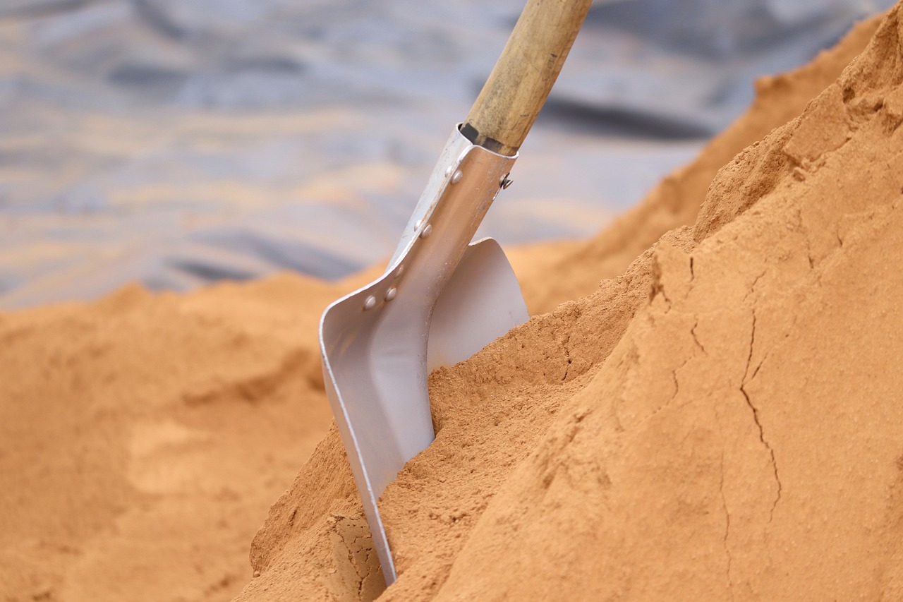 Shovel in sand.