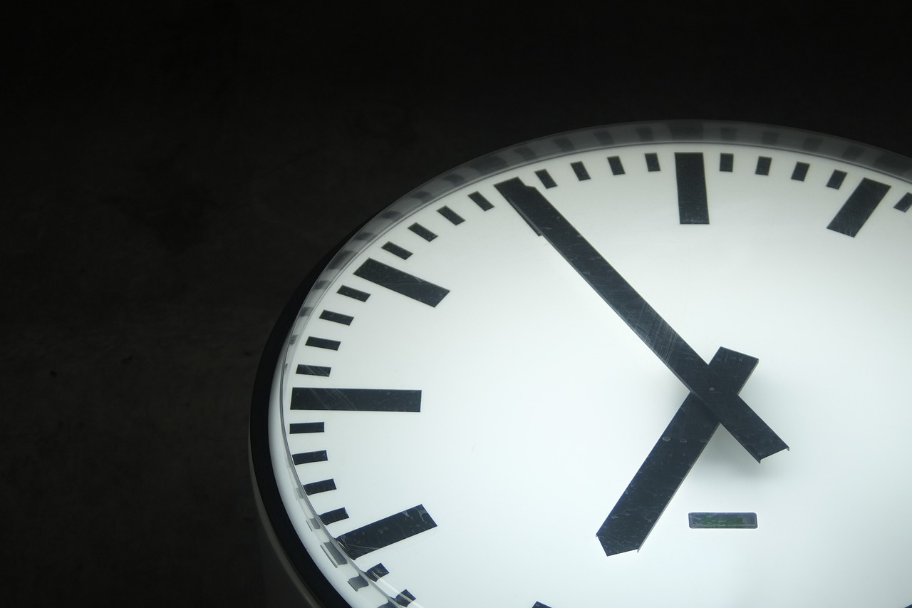 A clock ticks.
