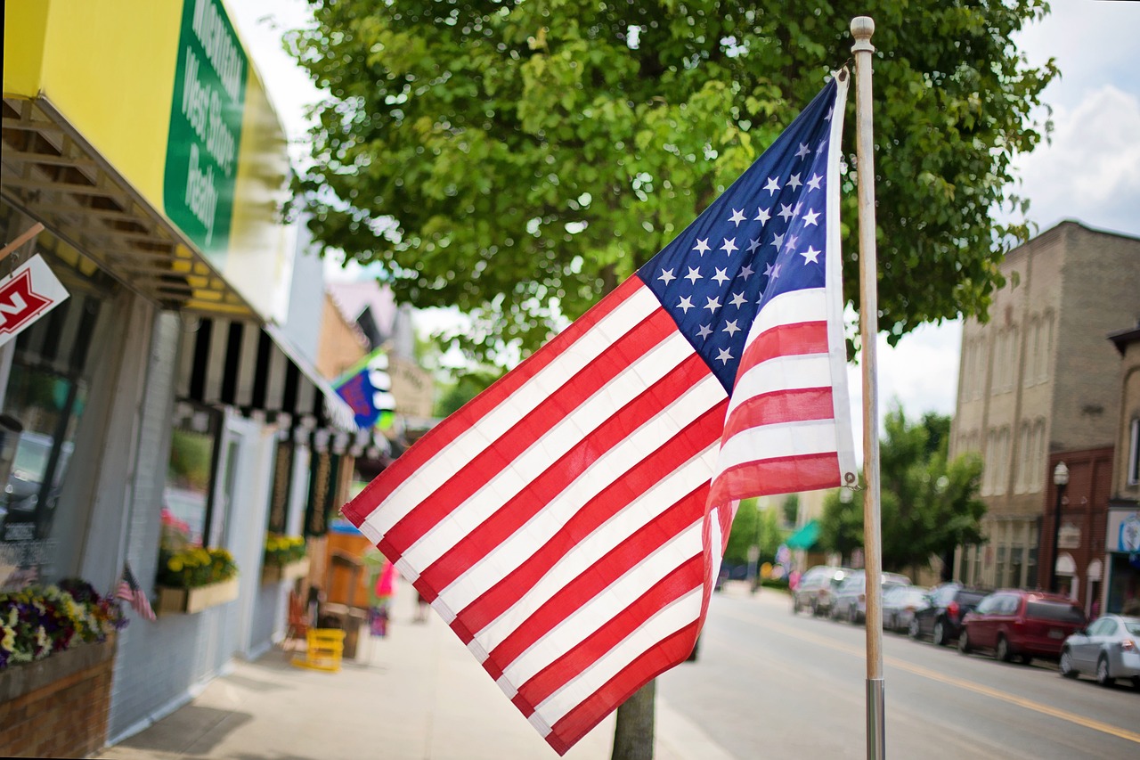 The American flag on a small town street.