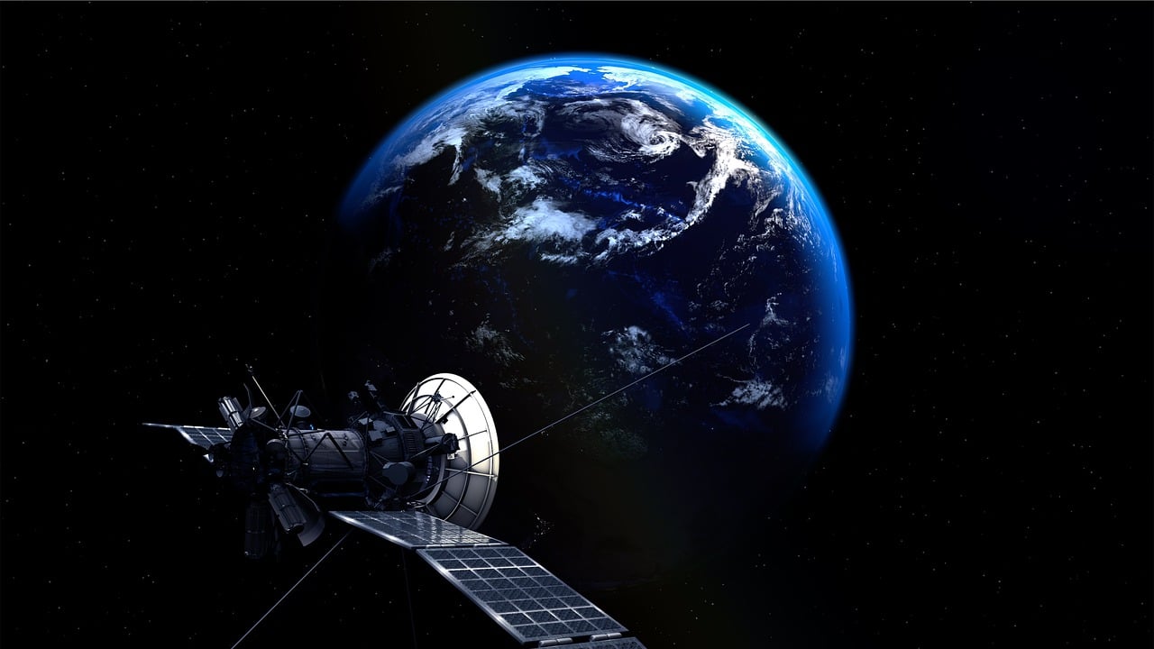 A satellite is shown in orbit.