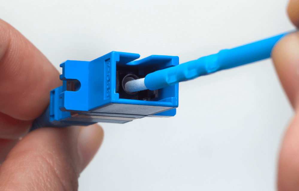 How to maintain clean connections in blown fiber systems
