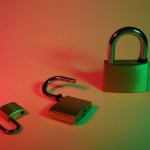 green and silver padlock on yellow surface