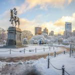 man riding horse statue on snow covered ground during daytime