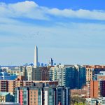 city skyline under blue sky during daytime