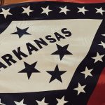 a flag with the name of the state of arkansas