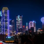 city skyline during night time