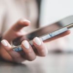 person holding black smartphone