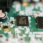 a close up of a circuit board with electronic components