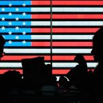 silhouette of people sitting on chair