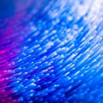 a close up of a blue and red background