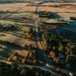 an aerial view of a rural area with a river running through it